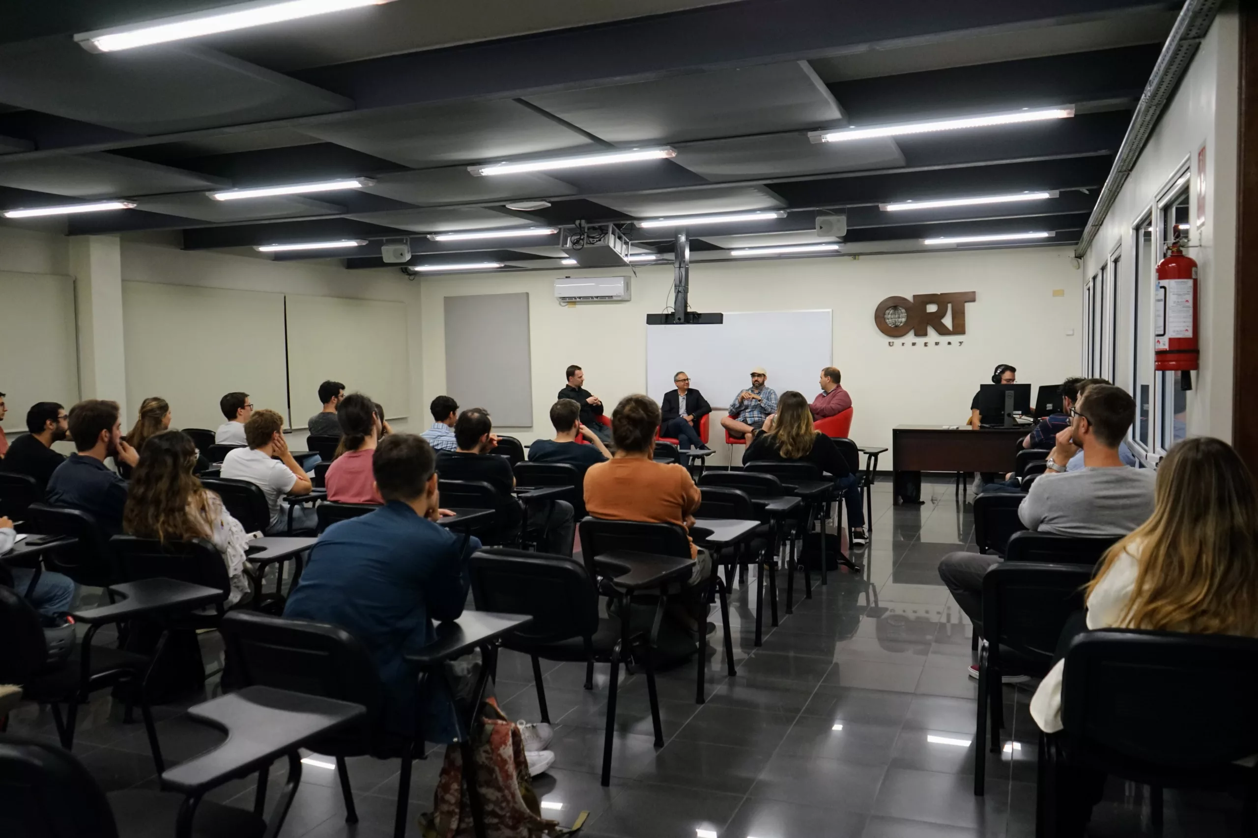 MonteVIDEO Tech community members talking during a break